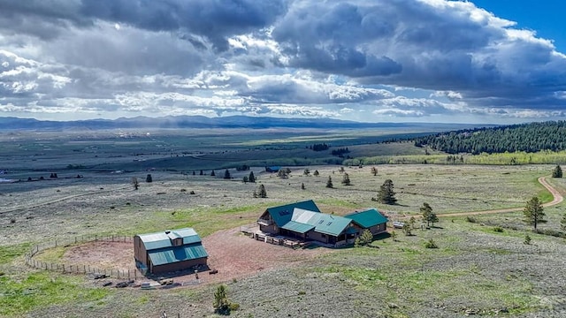 drone / aerial view with a rural view and a mountain view