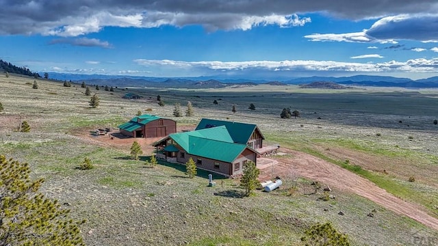 bird's eye view with a rural view and a mountain view