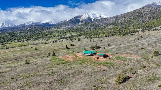 mountain view featuring a rural view