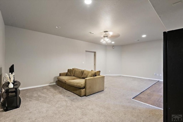 living area with carpet flooring, recessed lighting, a ceiling fan, and baseboards