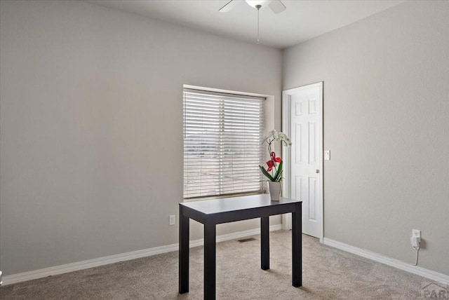 office with visible vents, baseboards, carpet, and ceiling fan