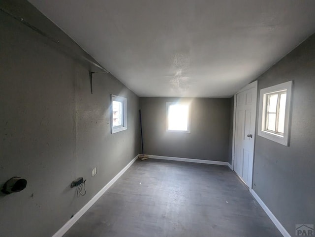 empty room featuring baseboards