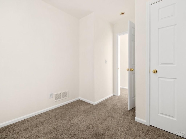 4400 Rawhide Rd Unit 132, Pueblo, CO 81008 - unfurnished room with baseboards, visible vents, and carpet