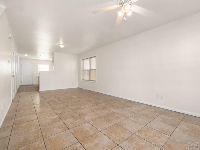4400 Rawhide Rd Unit 132, Pueblo, CO 81008 - spare room featuring ceiling fan, baseboards, and light tile patterned floors