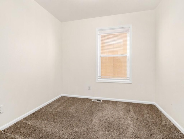4400 Rawhide Rd Unit 132, Pueblo, CO 81008 - spare room with carpet, visible vents, and baseboards