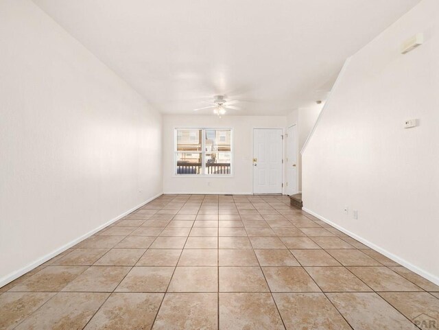 4400 Rawhide Rd Unit 132, Pueblo, CO 81008 - spare room featuring baseboards, ceiling fan, and light tile patterned floors