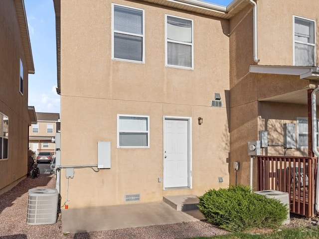 4400 Rawhide Rd Unit 132, Pueblo, CO 81008 - rear view of property with central air condition unit and stucco siding