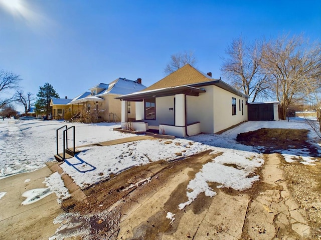 view of front of home featuring stucco siding