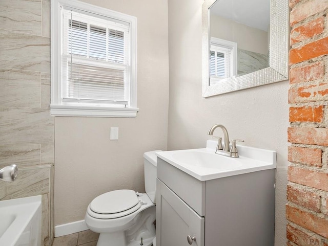 2619 7th Ave, Pueblo, CO 81003 - bathroom with vanity, toilet, and tile patterned floors