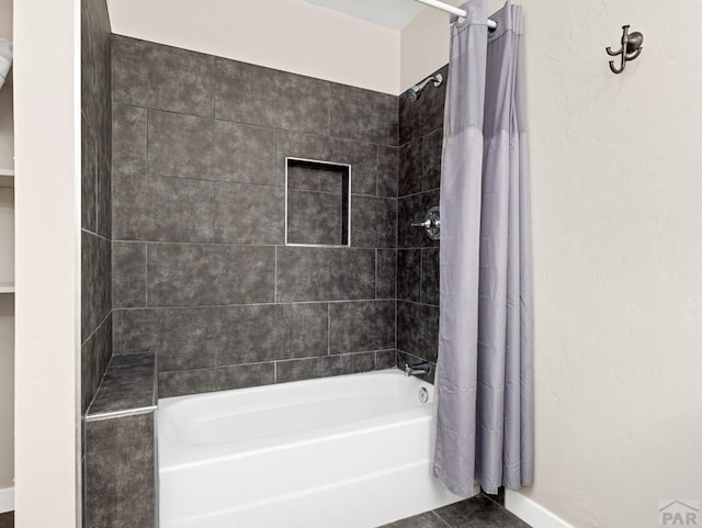 2619 7th Ave, Pueblo, CO 81003 - bathroom featuring shower / bath combo, baseboards, and tile patterned floors