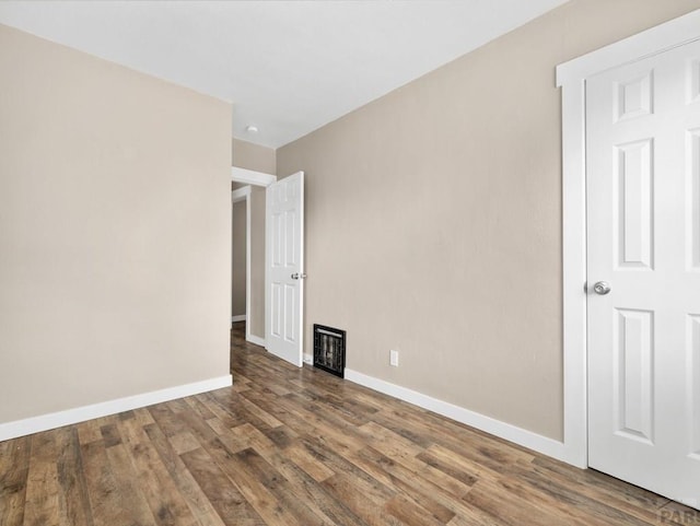 2619 7th Ave, Pueblo, CO 81003 - empty room with baseboards and wood finished floors