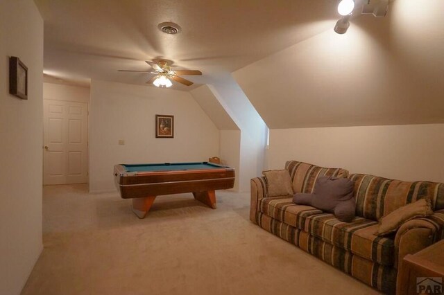 recreation room featuring light colored carpet, pool table, visible vents, a ceiling fan, and vaulted ceiling