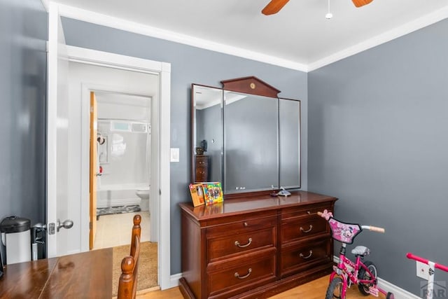 bedroom featuring baseboards and ornamental molding