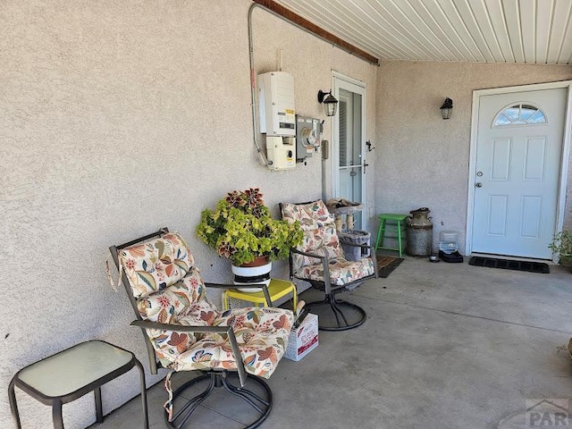 view of patio / terrace featuring water heater