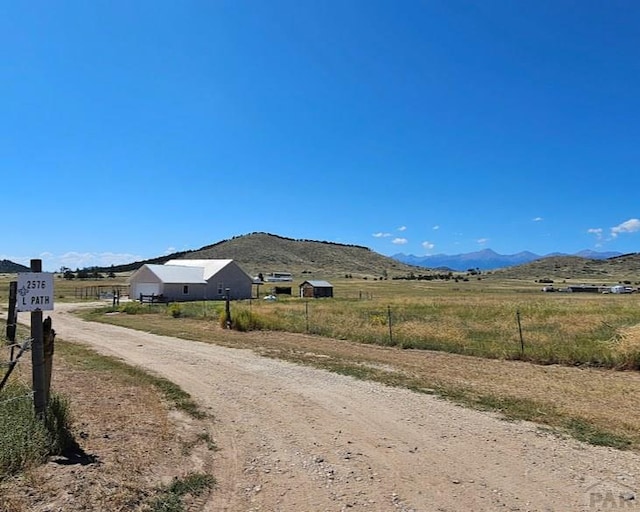 property view of mountains with a rural view