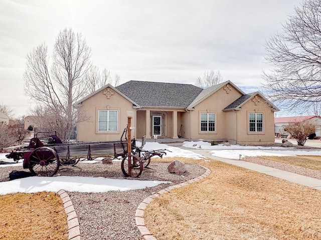 view of front of property featuring stucco siding