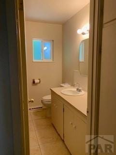 417 Park Dr, Pueblo, CO 81005 - bathroom with vanity, toilet, and tile patterned floors
