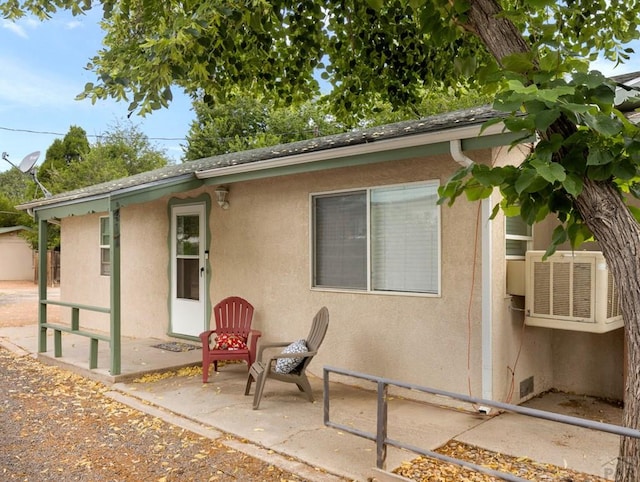 417 Park Dr, Pueblo, CO 81005 - back of house with stucco siding, a patio area, and cooling unit