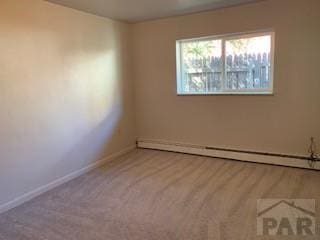 417 Park Dr, Pueblo, CO 81005 - unfurnished room featuring a baseboard radiator and baseboards