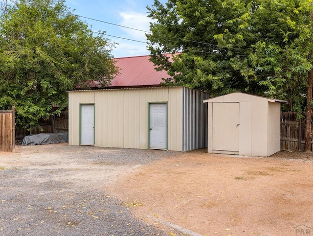 417 Park Dr, Pueblo, CO 81005 - garage featuring a shed