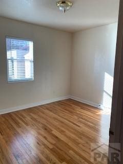417 Park Dr, Pueblo, CO 81005 - spare room with wood finished floors and baseboards
