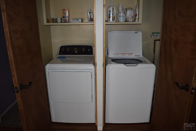 laundry room with laundry area and separate washer and dryer