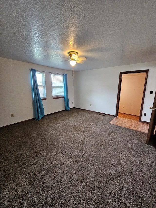 789 W 4th Ave, Springfield, CO 81073 - unfurnished room with carpet, ceiling fan, a textured ceiling, and baseboards