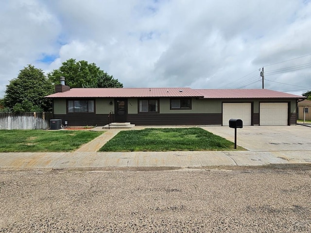 789 W 4th Ave, Springfield, CO 81073 - single story home with an attached garage, concrete driveway, metal roof, and central AC