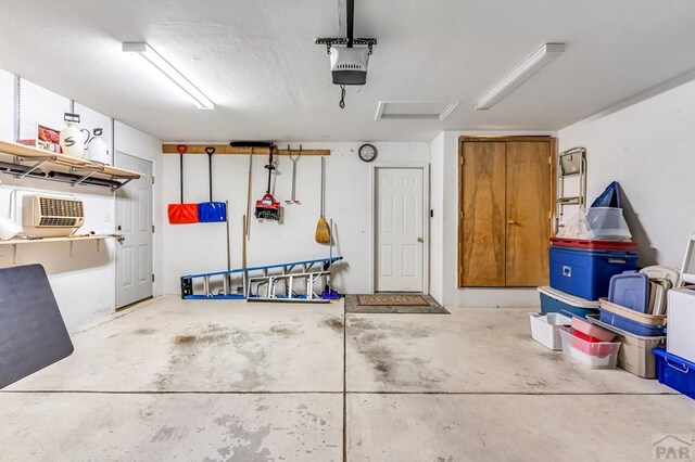5048 Sage St, Pueblo, CO 81005 - garage with a garage door opener
