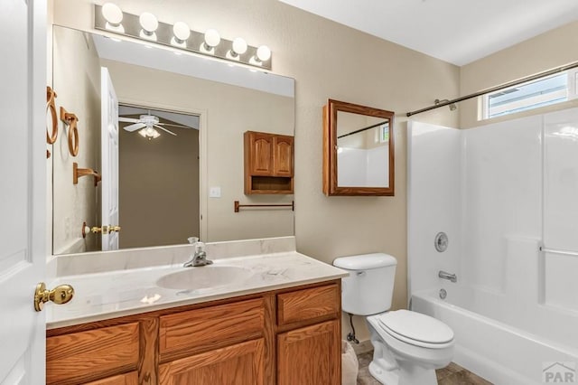 5048 Sage St, Pueblo, CO 81005 - bathroom with vanity, toilet, shower / bath combination, and ceiling fan