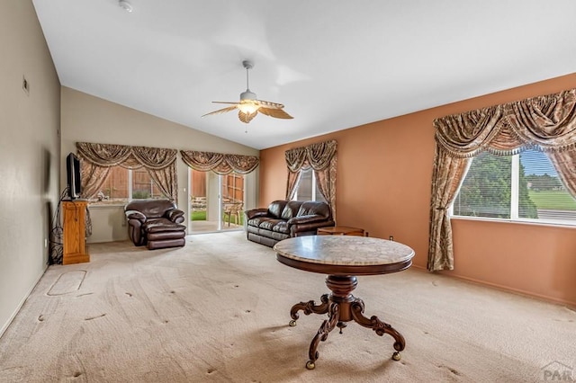 5048 Sage St, Pueblo, CO 81005 - living area featuring plenty of natural light, carpet, lofted ceiling, a ceiling fan, and baseboards