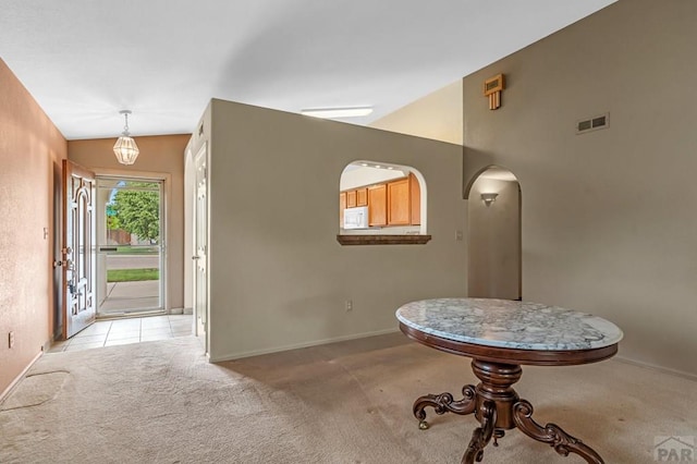5048 Sage St, Pueblo, CO 81005 - foyer entrance with light colored carpet and baseboards