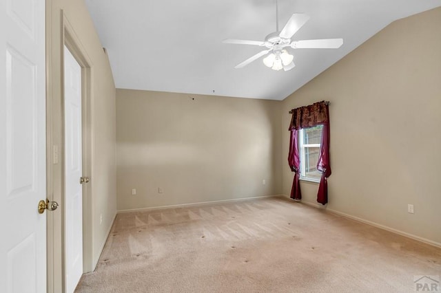 5048 Sage St, Pueblo, CO 81005 - empty room featuring carpet, vaulted ceiling, ceiling fan, and baseboards