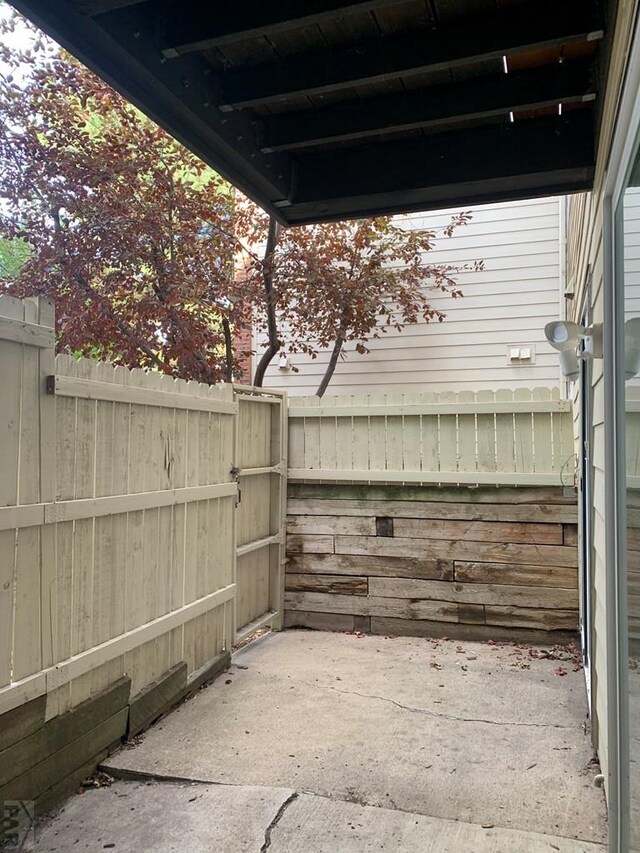 view of patio with fence