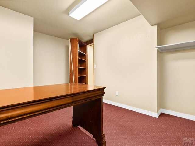 1705 Aquila Dr, Pueblo, CO 81008 - unfurnished office featuring carpet flooring and baseboards
