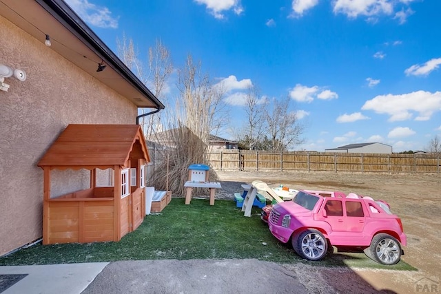 view of yard featuring fence