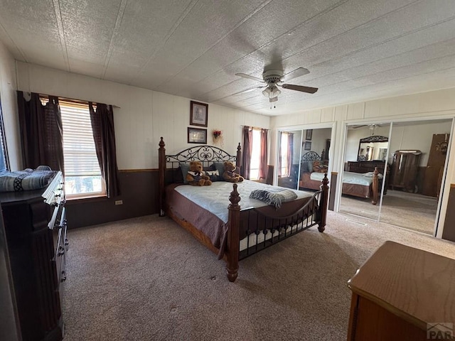 604 Townsend Ave, Olney Springs, CO 81062 - bedroom featuring carpet floors, ceiling fan, and two closets