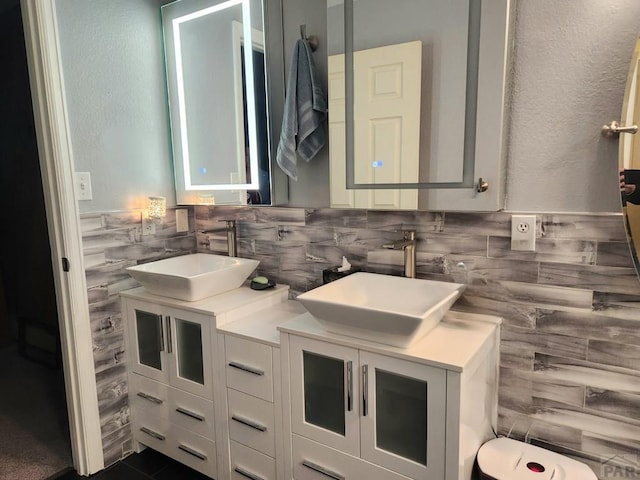 bathroom with double vanity and a sink