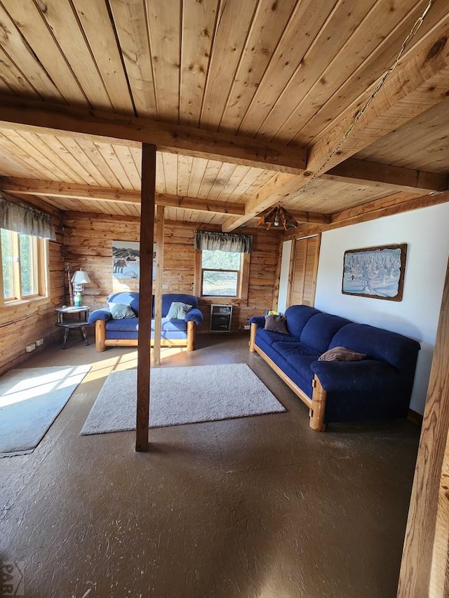 unfurnished living room with heating unit, wood ceiling, beam ceiling, and a wealth of natural light