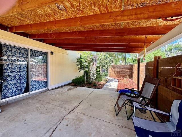 view of patio with fence