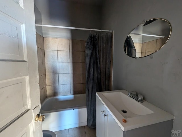 bathroom with tile patterned floors, shower / bath combo, and vanity