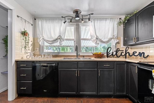 1516 Zuni Rd, Pueblo, CO 81001 - kitchen with black appliances, tasteful backsplash, light countertops, and dark wood-style floors