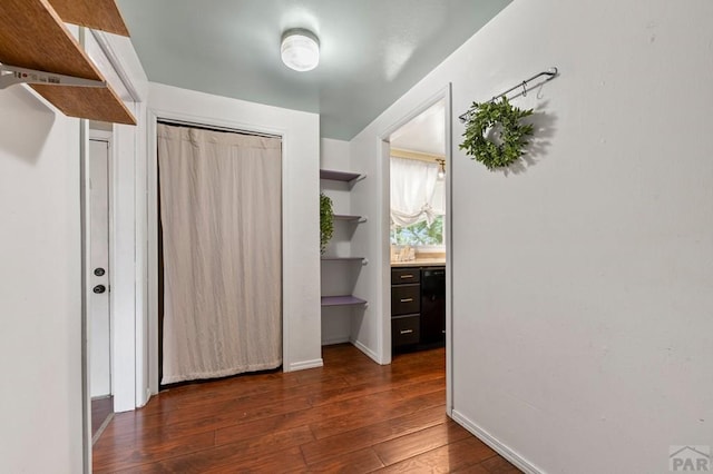 1516 Zuni Rd, Pueblo, CO 81001 - corridor with dark wood finished floors and baseboards