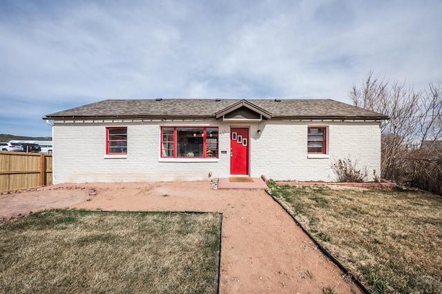 501 E Main St, Trinidad, CO 81082 - single story home with brick siding and roof with shingles