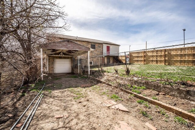 501 E Main St, Trinidad, CO 81082 - view of yard featuring fence and a vegetable garden