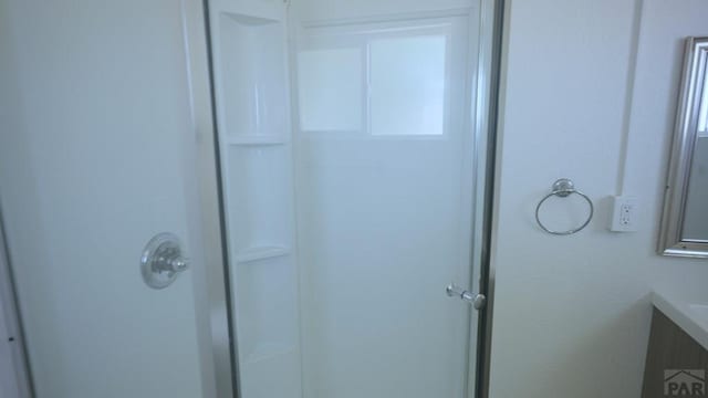 1434 E Evans Ave, Pueblo, CO 81004 - bathroom featuring a shower and vanity