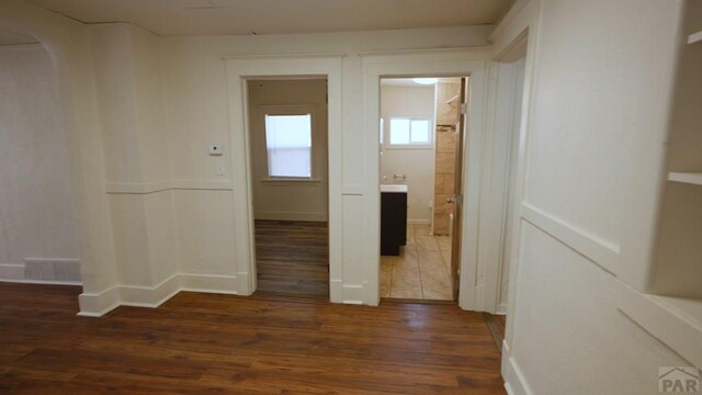 1434 E Evans Ave, Pueblo, CO 81004 - interior space featuring visible vents and dark wood finished floors