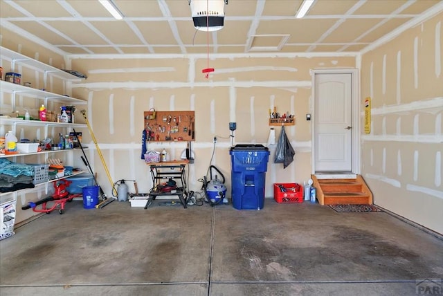 garage featuring a garage door opener