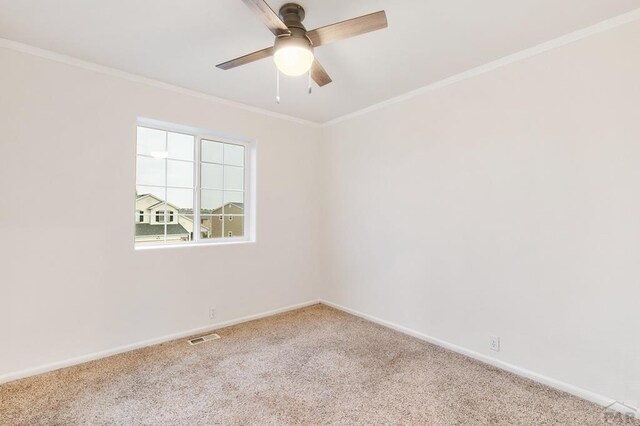 8718 Silver Glen Dr, Fountain, CO 80817 - spare room with carpet flooring, ceiling fan, and crown molding
