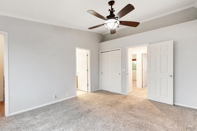 8718 Silver Glen Dr, Fountain, CO 80817 - unfurnished bedroom with light colored carpet, ornamental molding, a closet, and ceiling fan
